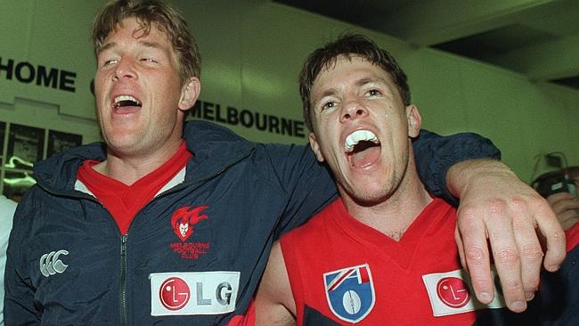  David Schwarz and Steven Febey sing the club song after winning by eight goals. 1998 Qualifying final. Melbourne v Adelaide ...