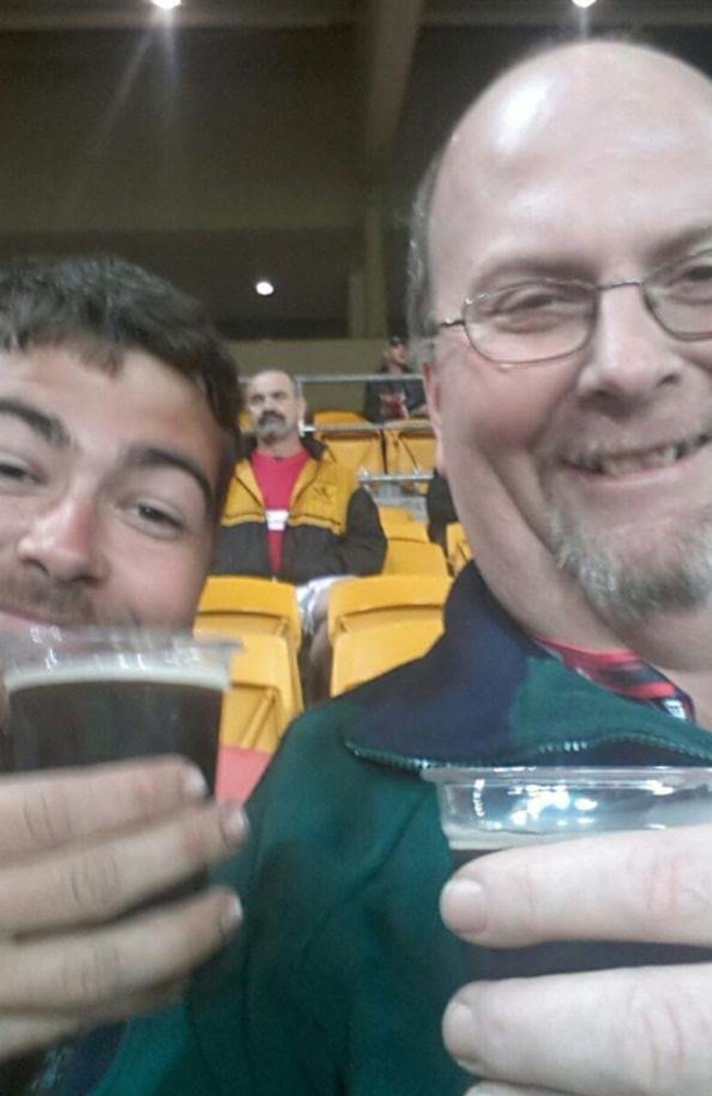 Aaron with his dad Ian Seibel at a Queensland Reds game.