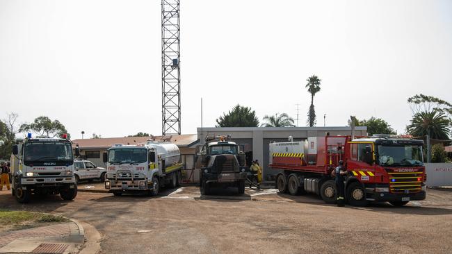 Army, MFS and CFS crews receiving water fills at Parndana CFS station. Picture: Brad Fleet