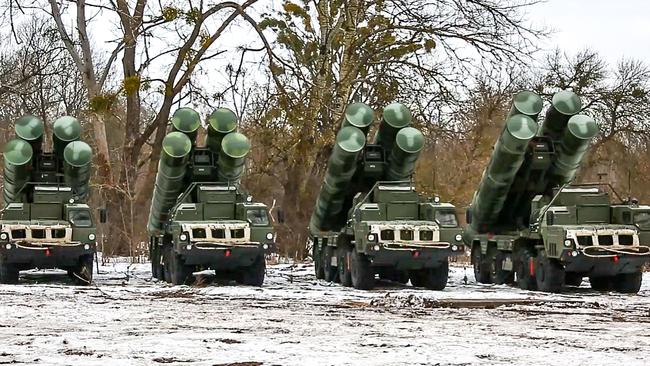 Russia has 130,000 troops poised to storm into its neighbour at any moment, sending our diplomats fleeing from Ukraine’s capital. Picture: AFP