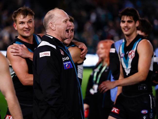 Port Adelaide coach Ken Hinkley exchanges words with Hawthorn players the semi-final win. Picture: Michael Willson/AFL Photos