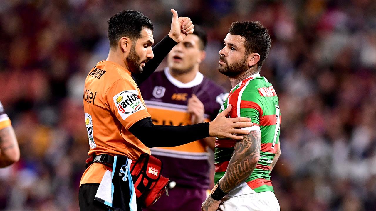 Adam Reynolds is given the thumbs up by the trainer against the Broncos.