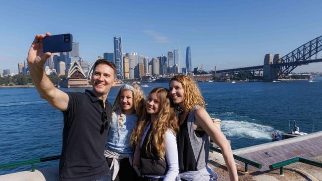 Dan and Fiona Johnson with their kids Ava, 13 and Elena 8 taking in the sights of Sydney Harbour from Kirribilli House. Picture: NCA NewsWire / David Swift