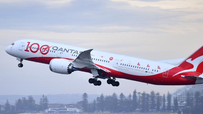 A Qantas 787 takes off from Sydney in November 2020. The airline hopes to be flying overseas regularly from mid-December. Picture: Getty Images