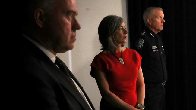 SA chief public health officer Professor Nicola Spurrier, centre, with health minister Stephen Wade and SA Police Commissioner Grant Stevens at a press conference. Picture: Kelly Barnes/Getty