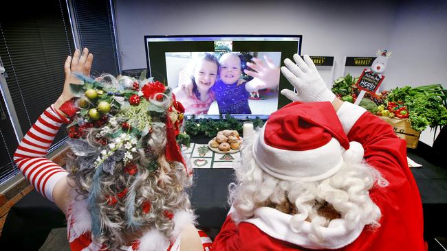 Santa and Mrs Claus zooming with six year old Eliza and his little brother, three year old Freddie. Picture: David Caird