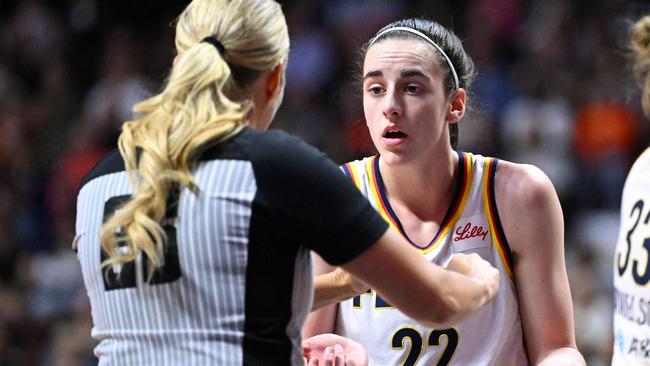 UNCASVILLE, CONNECTICUT - JUNE 10: Caitlin Clark #22 of the Indiana Fever argues with an official during the first half of a game against the Connecticut Sun at the Mohegan Sun Arena on June 10, 2024 in Uncasville, Connecticut. NOTE TO USER: User expressly acknowledges and agrees that, by downloading and or using this photograph, User is consenting to the terms and conditions of the Getty Images License Agreement.   Brian Fluharty/Getty Images/AFP (Photo by Brian Fluharty / GETTY IMAGES NORTH AMERICA / Getty Images via AFP)