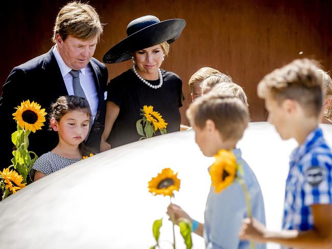 Dutch King Willem-Alexander (left) and Queen Maxima (centre) attend the unveiling of the national monument for the MH17 victims in Vijfhuizen. Picture: AFP/ANP/Remko de Waal