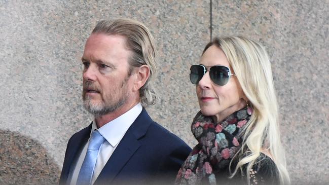 Craig McLachlan (left) and his partner Vanessa Scammell arrive at the Melbourne Magistrates Court today. Picture: Erik Anderson/AAP.