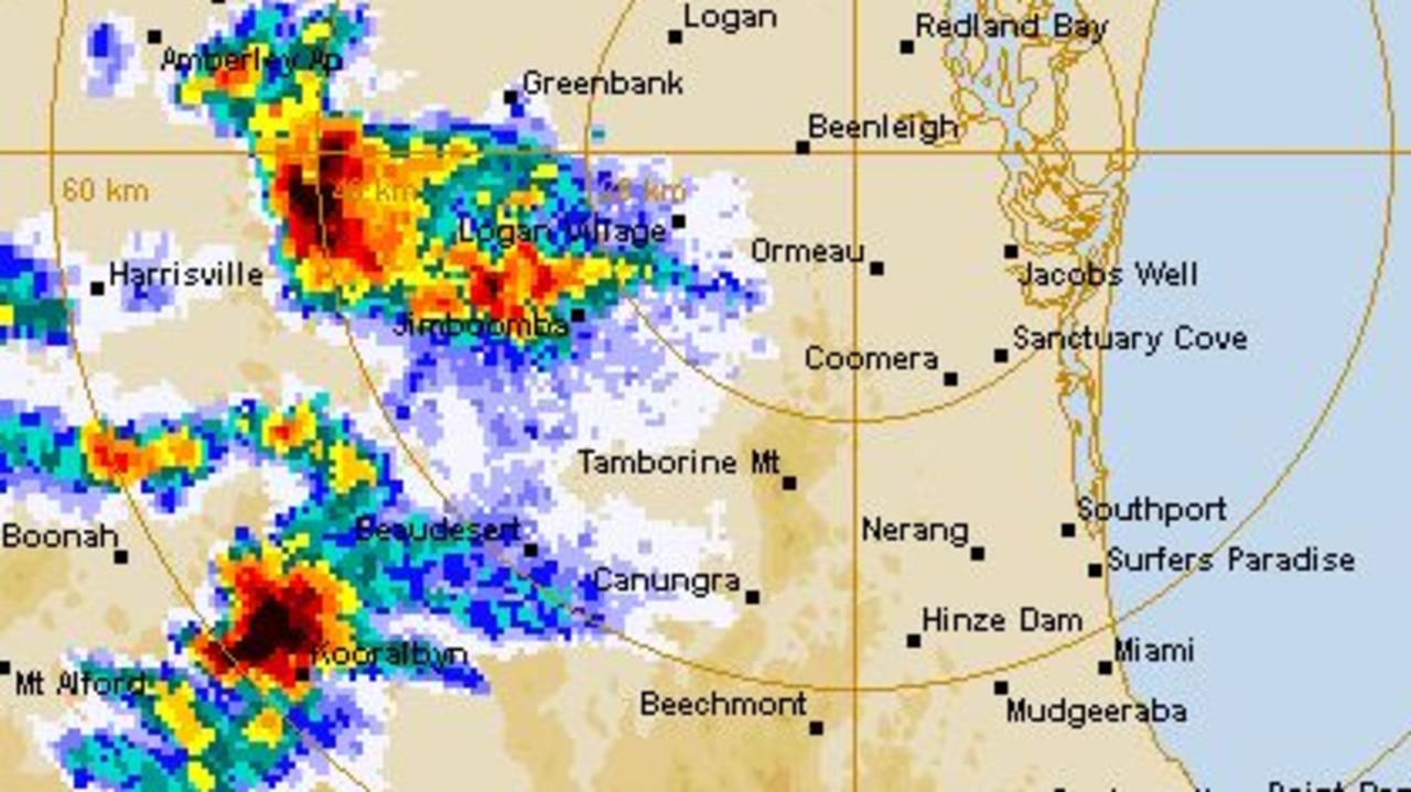 Large hailstones, heavy rain, wild winds: Triple threat as severe storms lash SEQ