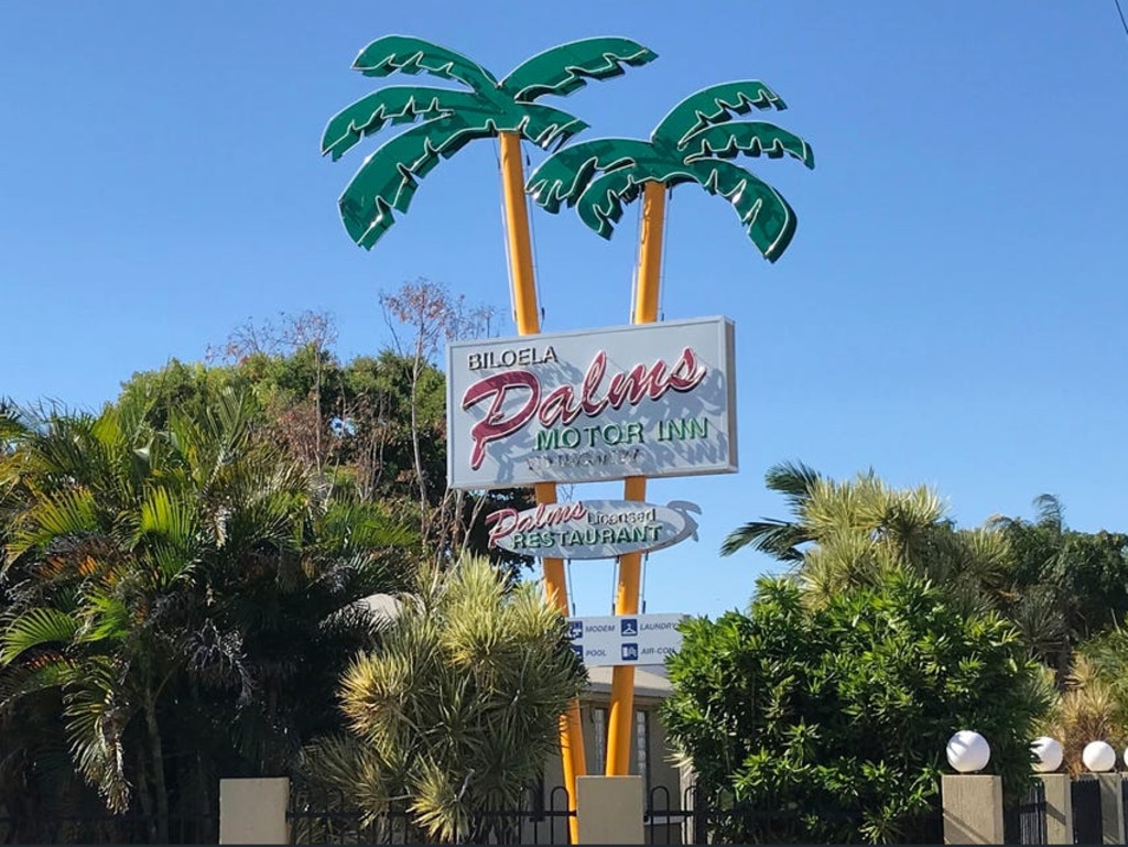 Complete with neon palm tree sign, this Queenslander already had mid century vibes. Picture: Supplied