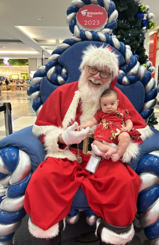 Grace McLeod Pitt (Whitsundays and Bowen's Cutest baby of 2023) with Santa: Whitsundays Plaza 2023. Sent in by Shannon Elwin. 