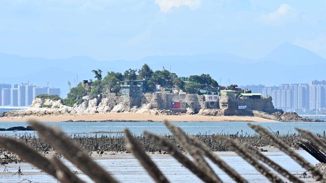 A Taiwanese military outpost on Shihyu islet is seen past anti-landing spikes. Picture: AFP