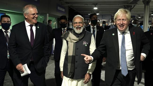 Prime Minister Scott Morrison with the UK Prime Minister Boris Johnson and Prime Minister of India at the COP 26 Climate summit in Glasgow. Picture: Adam Taylor