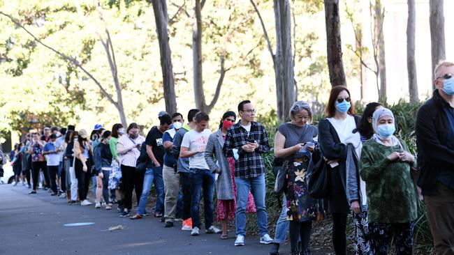 Sydney-siders line-up at the new COVID-19 Vaccination Centre at Sydney Olympic Park. Picture: NCA NewsWire / Jeremy Piper