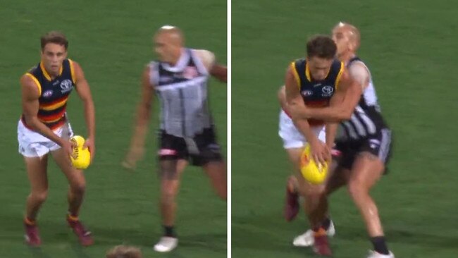 Lachie Sholl gets tackled by Sam Powell-Pepper.