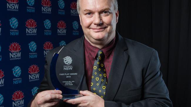 Granville Football Association director Kevin Haines with the Fair Play award presented at the 2015 Football NSW state dinner in November. Picture: Gavin Leung