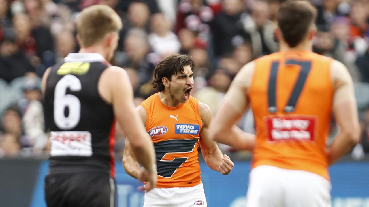 Bedford (centre) celebrates his first-quarter goal against the Sanits. (Photo by Darrian Traynor/AFL Photos/via Getty Images)