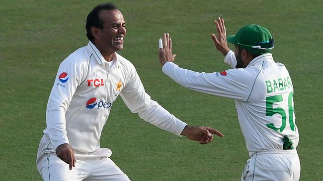 Nauman Ali celebrates one of his four wickets. Picture: AFP