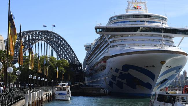 Cruise ship passengers disembark from the Ruby Princess at Circular Quay in Sydney on Thursday. Picture: AAP/DEAN LEWINS