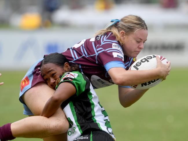 Townsville Blackhawks Harvey Norman girls U19 against CQ Capras at Jack Manski Oval. Zaleah Mosby-Nona tackles Capras No.15. Picture: Evan Morgan