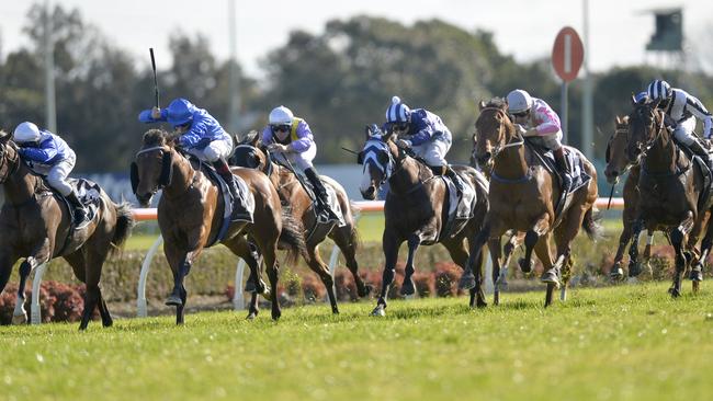 Jockey Hugh Bowman wins on Burnt Bridges.