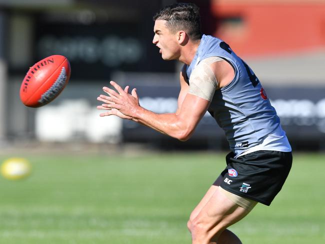 Tom Rockliff of the Power is seen during a training session at Alberton Oval in Adelaide, Tuesday, April 2, 2019. (AAP Image/David Mariuz) NO ARCHIVING