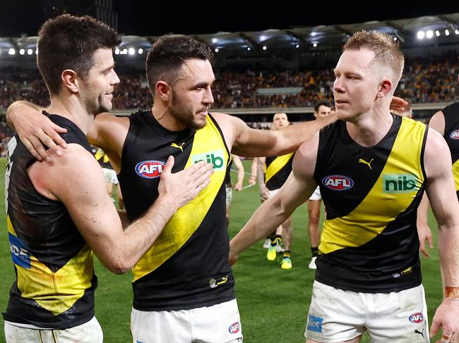 BRISBANE, AUSTRALIA - SEPTEMBER 01: Shane Edwards of the Tigers is chaired from the field after his final match by teammates Trent Cotchin (left) and Jack Riewoldt (right) during the 2022 AFL Second Elimination Final match between the Brisbane Lions and the Richmond Tigers at The Gabba on September 1, 2022 in Brisbane, Australia. (Photo by Michael Willson/AFL Photos via Getty Images)