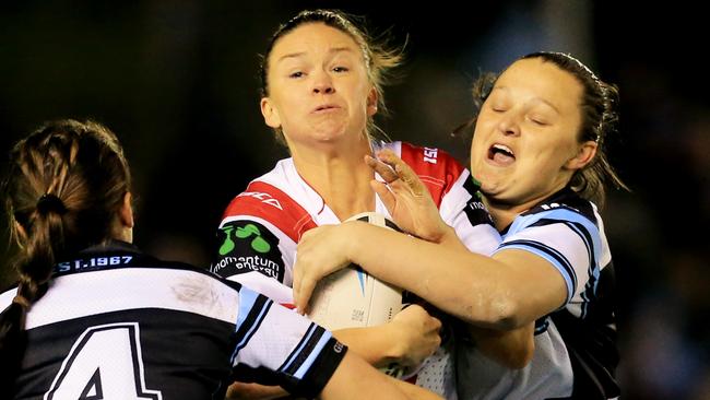 Alicia-Kate Hawke of the Dragons is tackled during the Sharks v Dragons womens nines match. pic Mark Evans