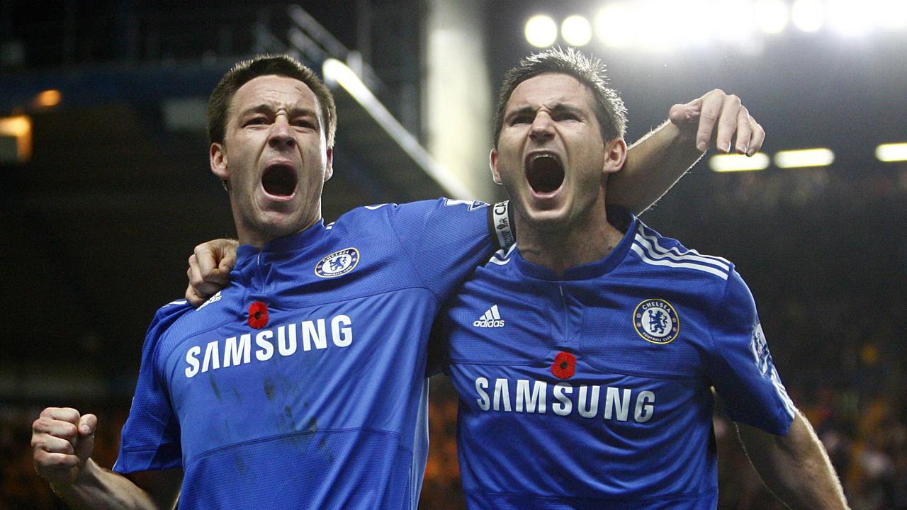 John Terry celebrates scoring against Manchester United with teammate Frank Lampard.