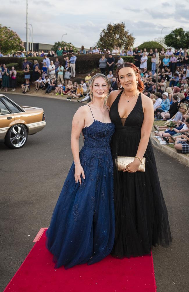 Jasmin Dennis (left) and Charlotte Barret at Harristown State High School formal at Highfields Cultural Centre, Friday, November 17, 2023. Picture: Kevin Farmer