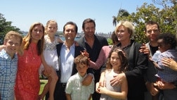 Diane Harapin pictured with Hollywood actor Hugh Jackman and his wife and adoption advocate Deborra-lee Furness. At the Kirribilli House launch of adoption reforms and government support, 2013. Picture: supplied.