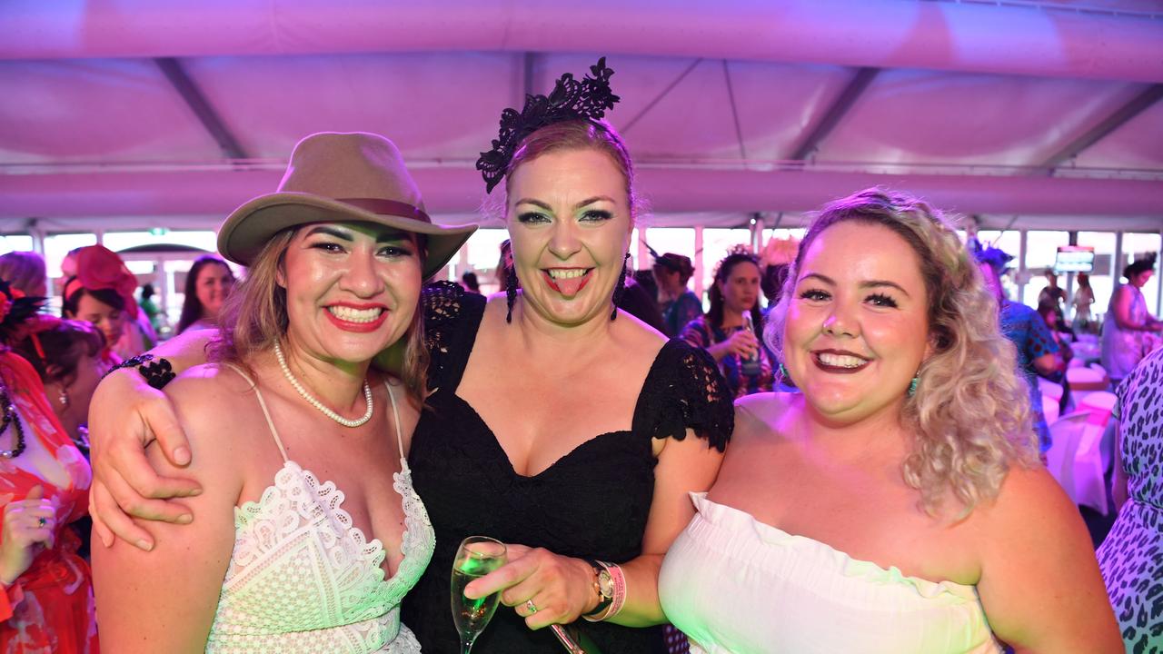 Joy Joy, Clare Summers and Genna Ryan on the dance floor at Darwin Ladies Day. Picture: (A)manda Parkinson