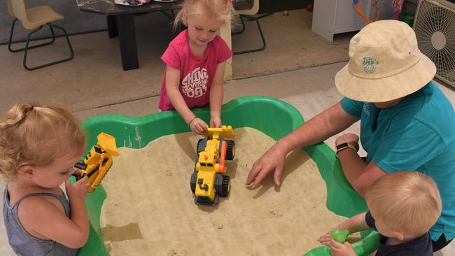 Hands on play with trucks in the sandpit. Photo: Kristen Camp