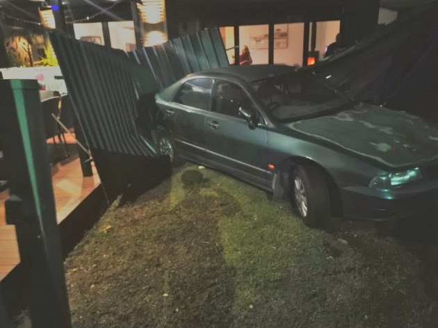 A car crashed into the backyard of a house at Beverly.