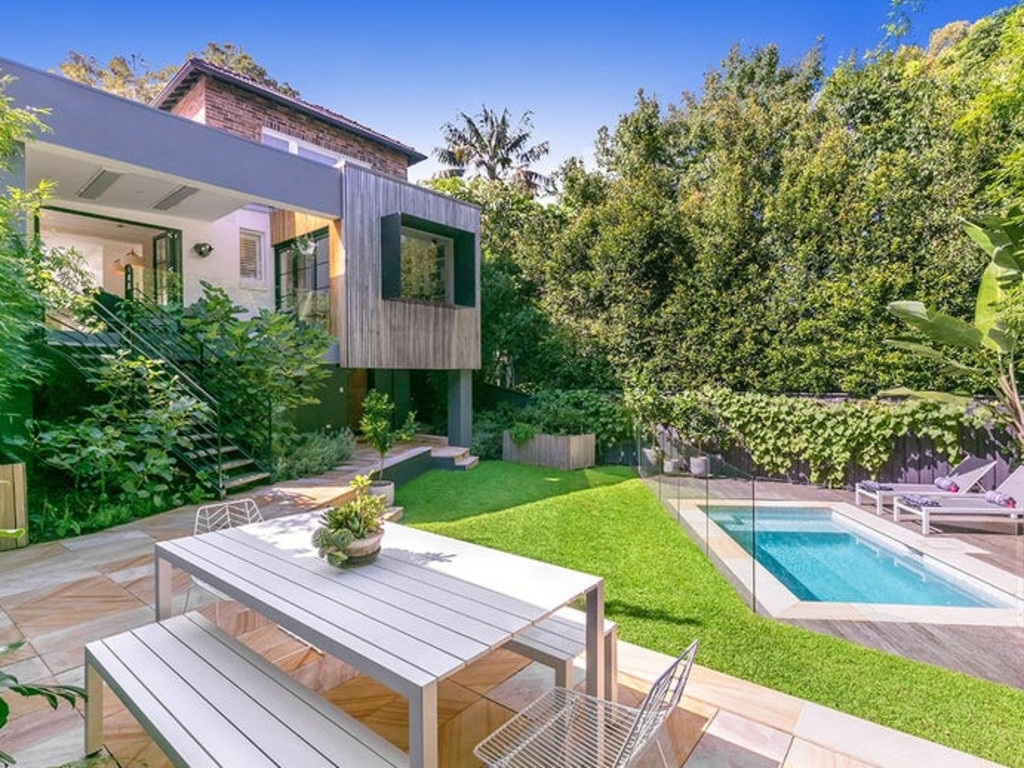 The lavish North Sydney property has an immaculate garden and a pool.