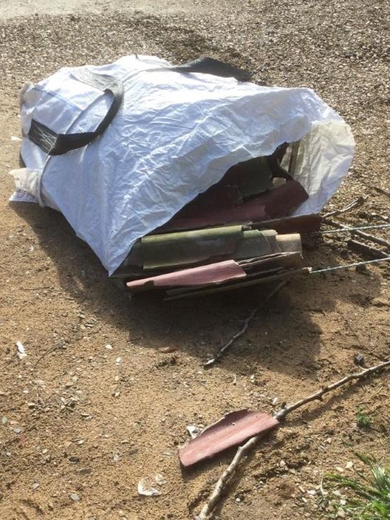 A bag of asbestos waste dumped at Dry Creek by a man who was prosecuted for illegal dumping. Picture: Supplied