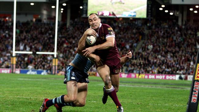 Queensland’s Adam Mogg goes for the corner and scores at Suncorp Stadium in 2006. Picture: Adam Head