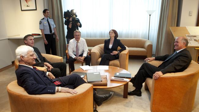 Then PM Julia Gillard with independents Bob Katter, (left) Rob Oakeshott (2nd left) and Tony Windsor (right) in Canberra in 2010.