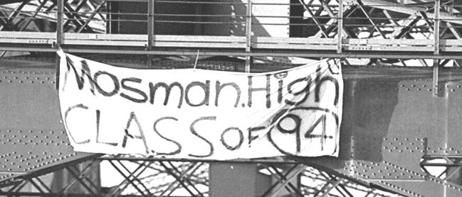 REWIND: Year 12 students from Mosman High School climbed Sydney Harbour Bridge as muck-up day prank to attach banner reading "Mosman High Class Of 94".