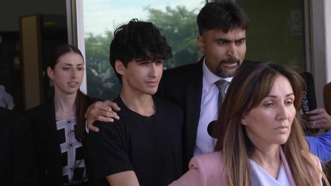 18-year-old Dhirren Randhawa leaves Christies Beach Magistrates Court with his mother Amreeta Stara in front. Picture: NCA NewsWire / Roy VanDerVegt