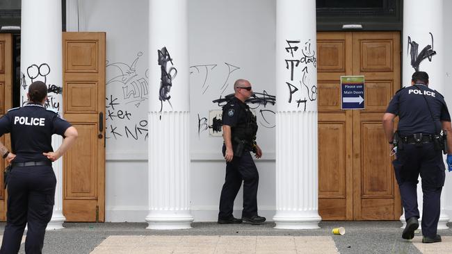 In March 2022, Cairns City Council Library on Abbott St was graffitied with numerous tags, crude comments and genital drawings in what appears to be a targeted and prolonged attack. Police officers investigated the crime scene. Picture: Brendan Radke