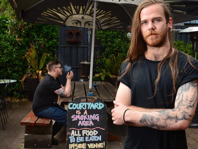 New laws mean that venues cannot serve food in smoking areas so some are converting their outdoor spaces into smoking only spaces. All diners will need to move inside to eat to allow people to smoke outdoors. Elwood Lounge chef Will Rooke, in the smoking courtyard.Picture : Nicki Connolly