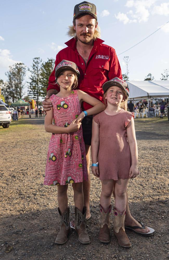 Reece McCarthy with daughters Felicity (left) and Josie McCarthy at Lights on the Hill Trucking Memorial at Gatton Showgrounds, Saturday, October 5, 2024. Picture: Kevin Farmer