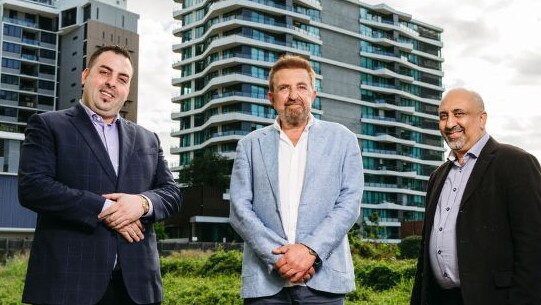 Descon chairman Danny Isaac with Wentworth Equities directors Simon Slavin and Sameh Ibrahim at the $70m Hamilton Towers site which Descon contracted to buy but did not settle.