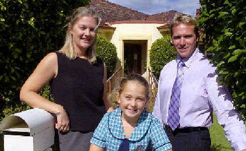 BIG WIN: Sandra Evans and daughter Tahlia, 8, of Lennox Head, with Les McGuire from Fairfulls Financial Services who has announced a donation to Our House. . Picture: Cathy Adams