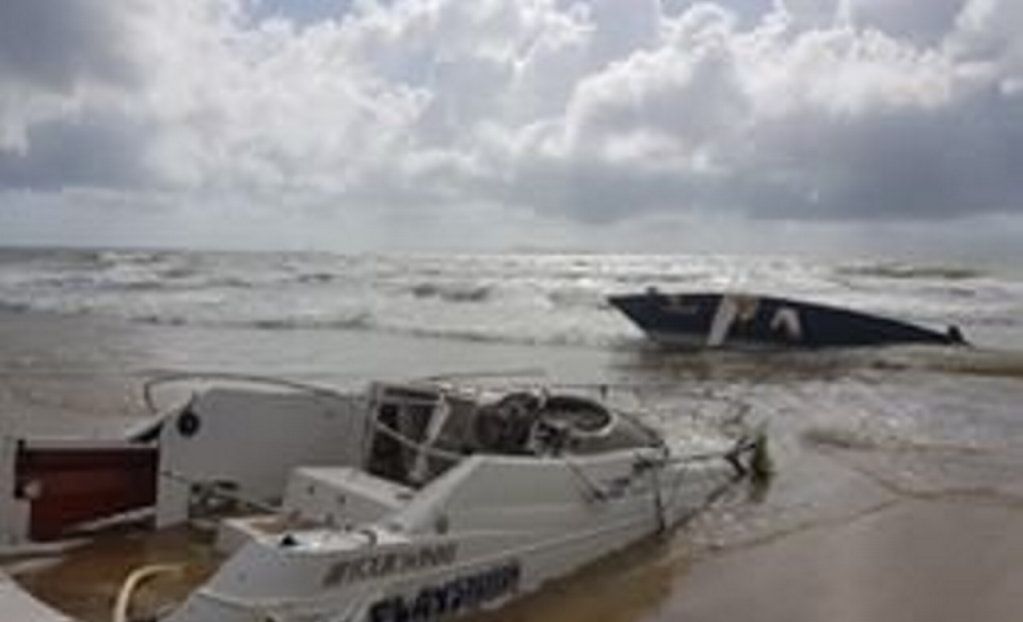 PIC GALLERY: Relentless tide destroys beached CQ boat | The Courier Mail