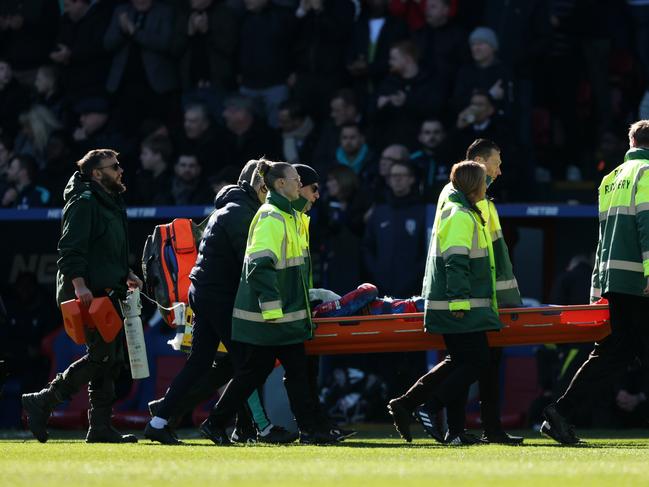 LONDON, ENGLAND – MARCH 01: Jean-Philippe Mateta of Crystal Palace is stretchered off the pitch by medical staff after a challenge by Liam Roberts of Millwall (not pictured) which resulted in a red card during the Emirates FA Cup Fifth Round match between Crystal Palace and Millwall at Selhurst Park on March 01, 2025 in London, England. (Photo by Julian Finney/Getty Images)