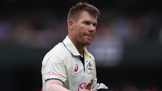 SYDNEY, AUSTRALIA - JANUARY 04: David Warner of Australia acknowledges the crowd after being dismissed by Agha Salman of Pakistan during day two of the Men's Third Test Match in the series between Australia and Pakistan at Sydney Cricket Ground on January 04, 2024 in Sydney, Australia. (Photo by Jason McCawley - CA/Cricket Australia via Getty Images)