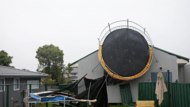 Trampoline wedged in a house after a mini tornado ripped through Chester Hill. Picture: Adam Yip